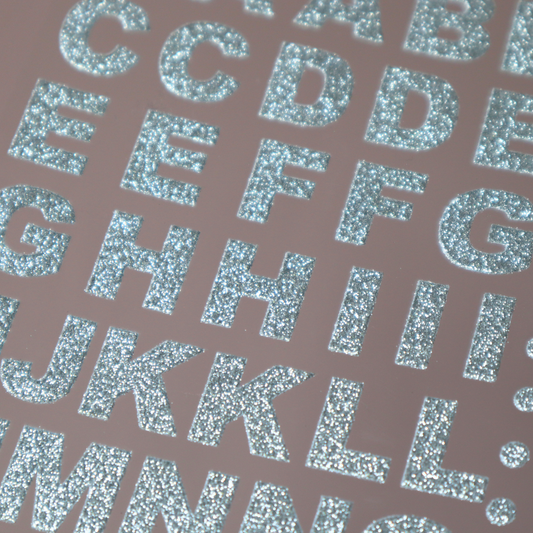 Glitter goud / zilver 1x